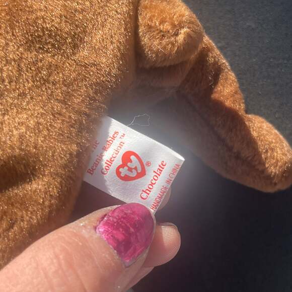 Very rare sticker covering tag ...Ty Beanie baby chocolate the Moose.
